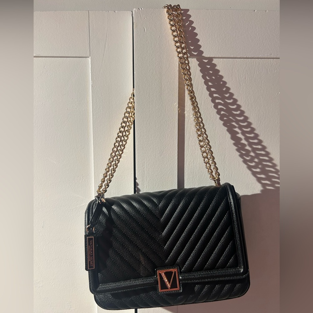 Black Quilted Shoulder Bag with Gold Chain